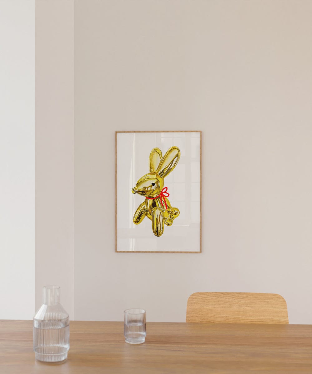 GOLD BUNNY WITH A RIBBON