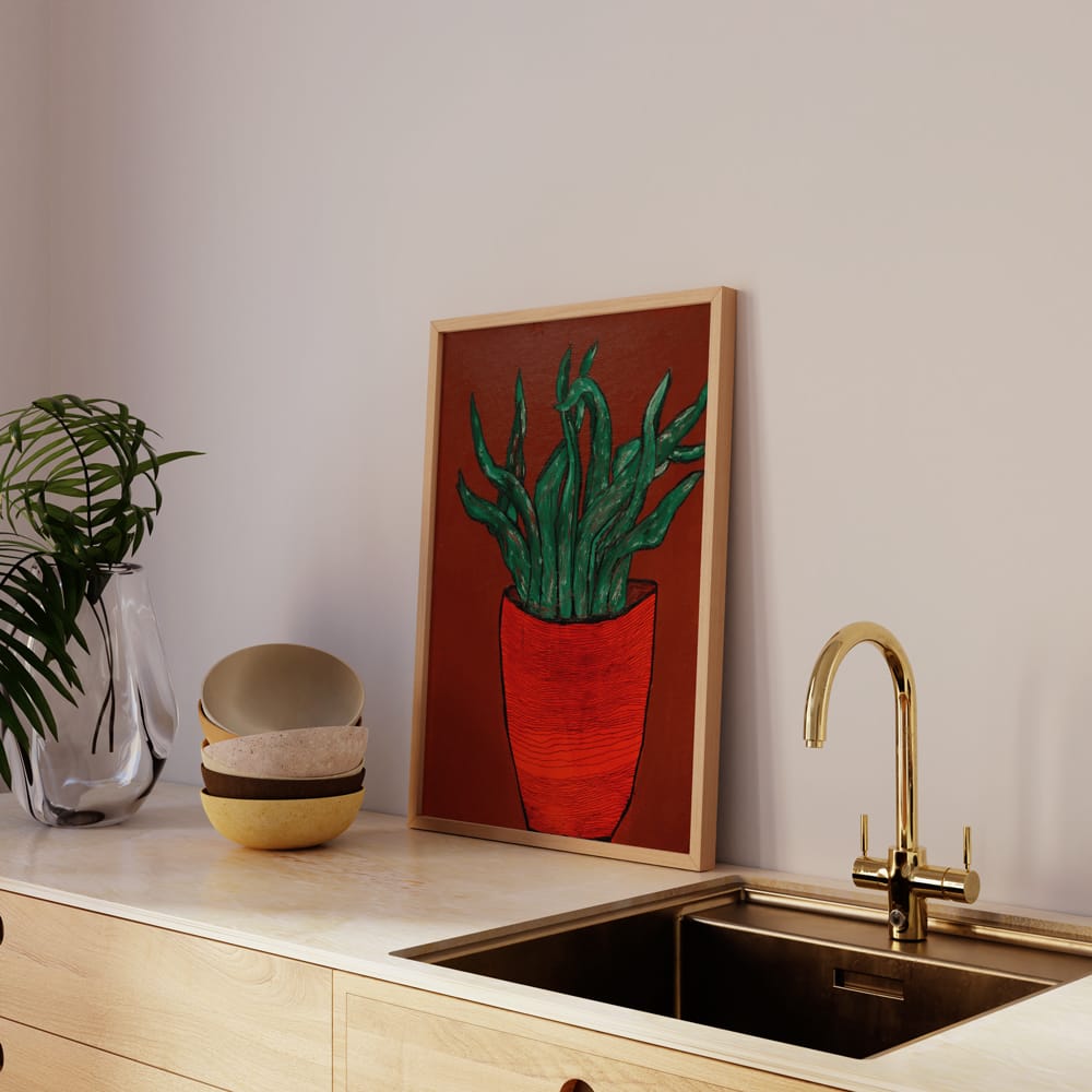 Green Plant In Red Pot