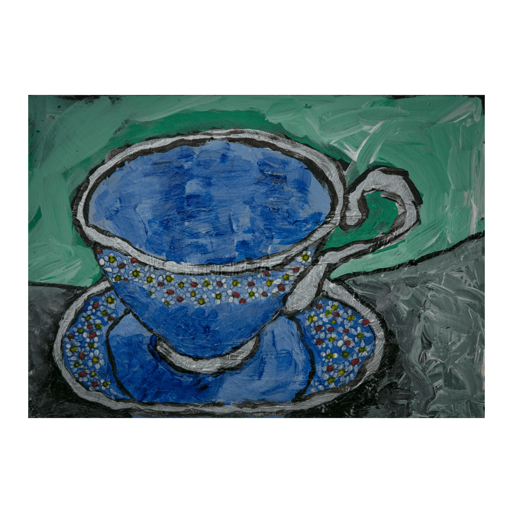 Blue Teacup On Green
